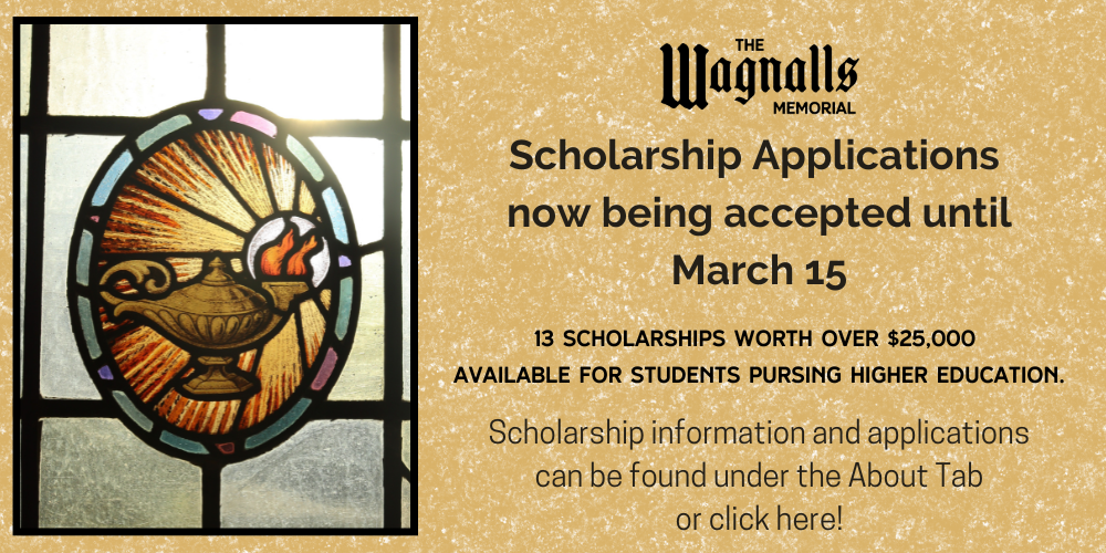 picture of stain glass window with lamp of knowledge